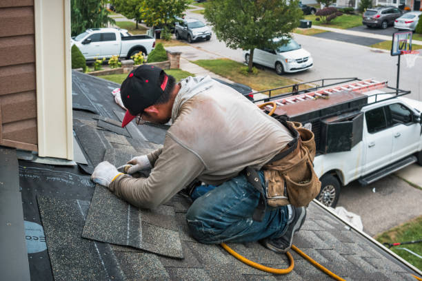 Professional Roofing technician working in Old Orchard Beach, ME